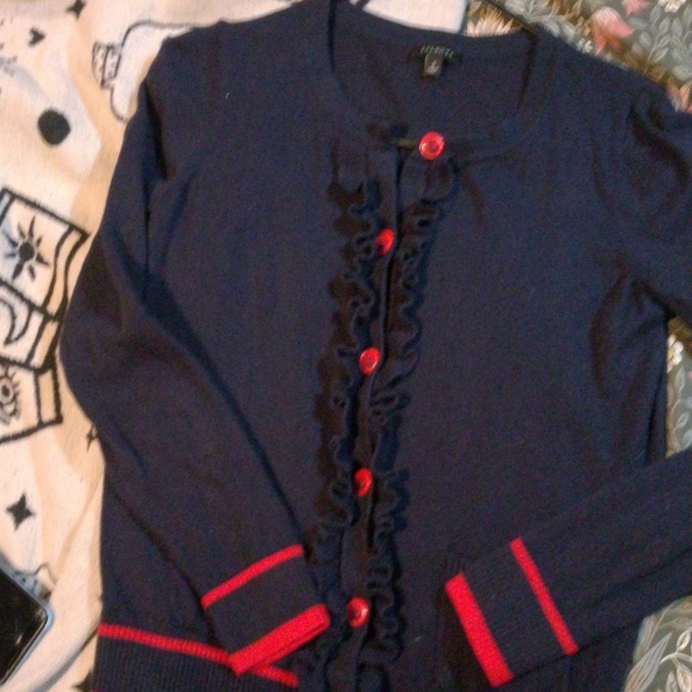 Navy blue and red sweater the Anker buttons.so cute